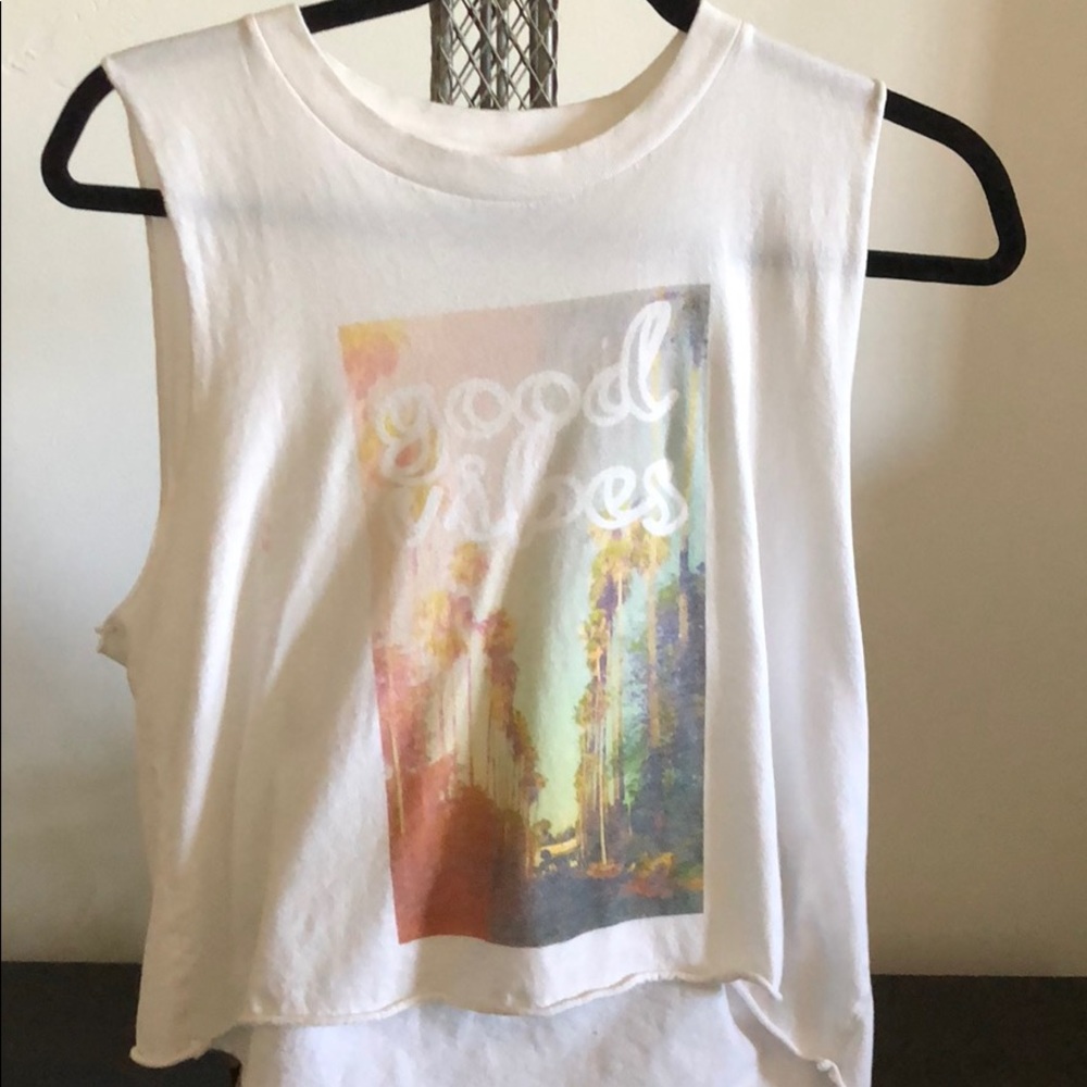 White sleeveless good vibes tank